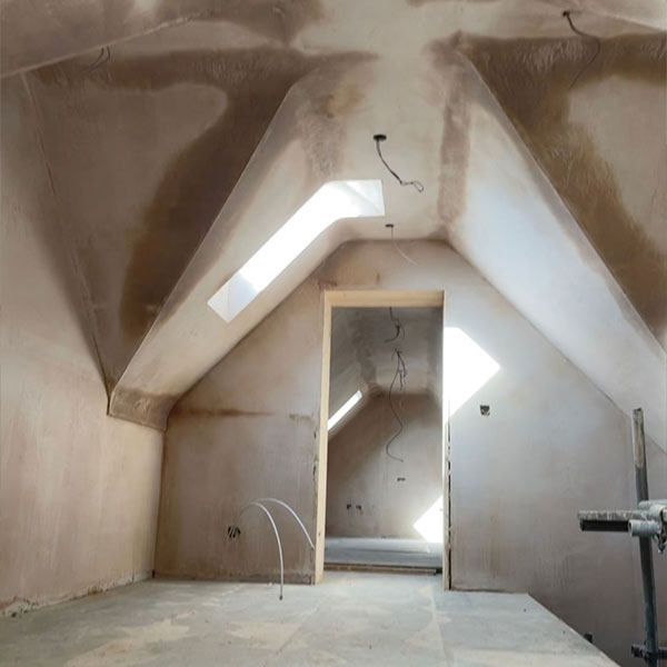 Wall and ceiling plastering at commercial unit